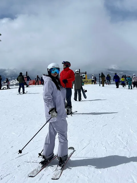 Blair skiing on a snowy mountain