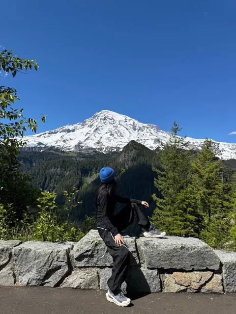 Blair taking in a snowy mountain view